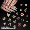 image:imageFAMDAMEI 24 Grid Nail Charms Nail Art Kit with Multi Shapes Bedazzling Gems for Nails Flatback AB Nail Rhinestones Nail Pearls Y2K Cute Nail Charms 3D Hawaii Flowers Nail Jewels for Nail Designyellow pink fruitgold red heartcolorful lolipop flower