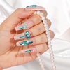 image:imageFAMDAMEI 24 Grid Nail Charms Nail Art Kit with Multi Shapes Bedazzling Gems for Nails Flatback AB Nail Rhinestones Nail Pearls Y2K Cute Nail Charms 3D Hawaii Flowers Nail Jewels for Nail Designgold pearls shellswhite AB pearls starfishblue gems